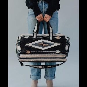 Beautiful Duffle Bag 
Made in the USA 
Lined 
Gorgeous